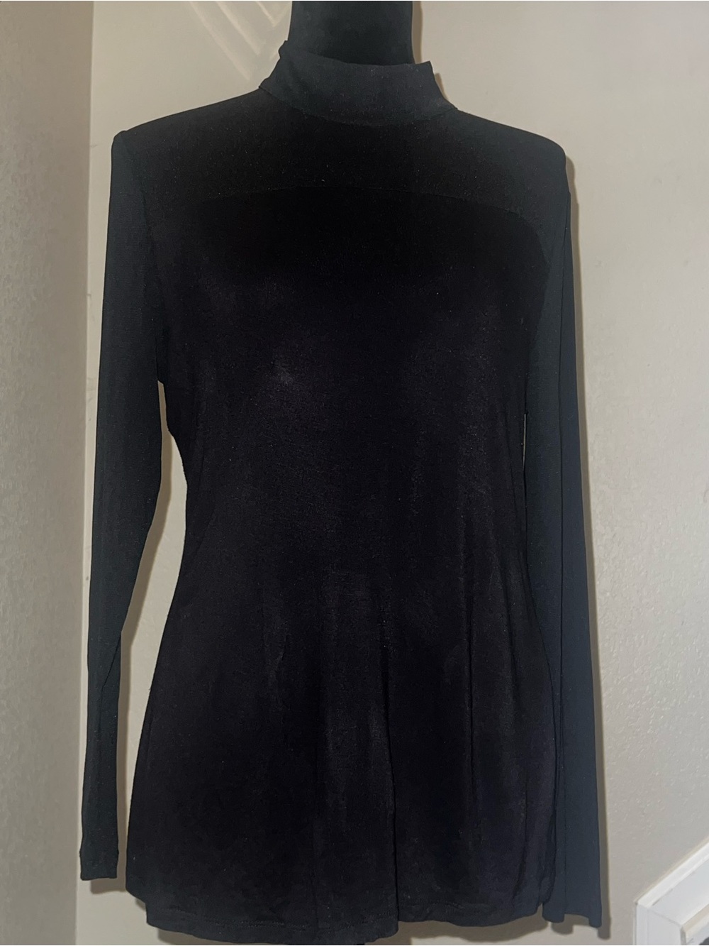 Macy's Black long sleeve  - decolletage and sleeves with a see through mesh